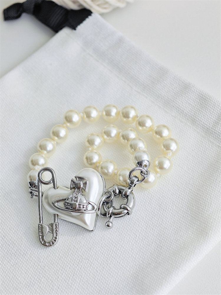 Classic Saturn pearl heart bracelet