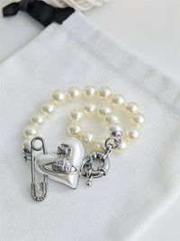 Classic Saturn pearl heart bracelet