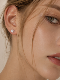 Full pavé stud earrings with a chic, luxe look