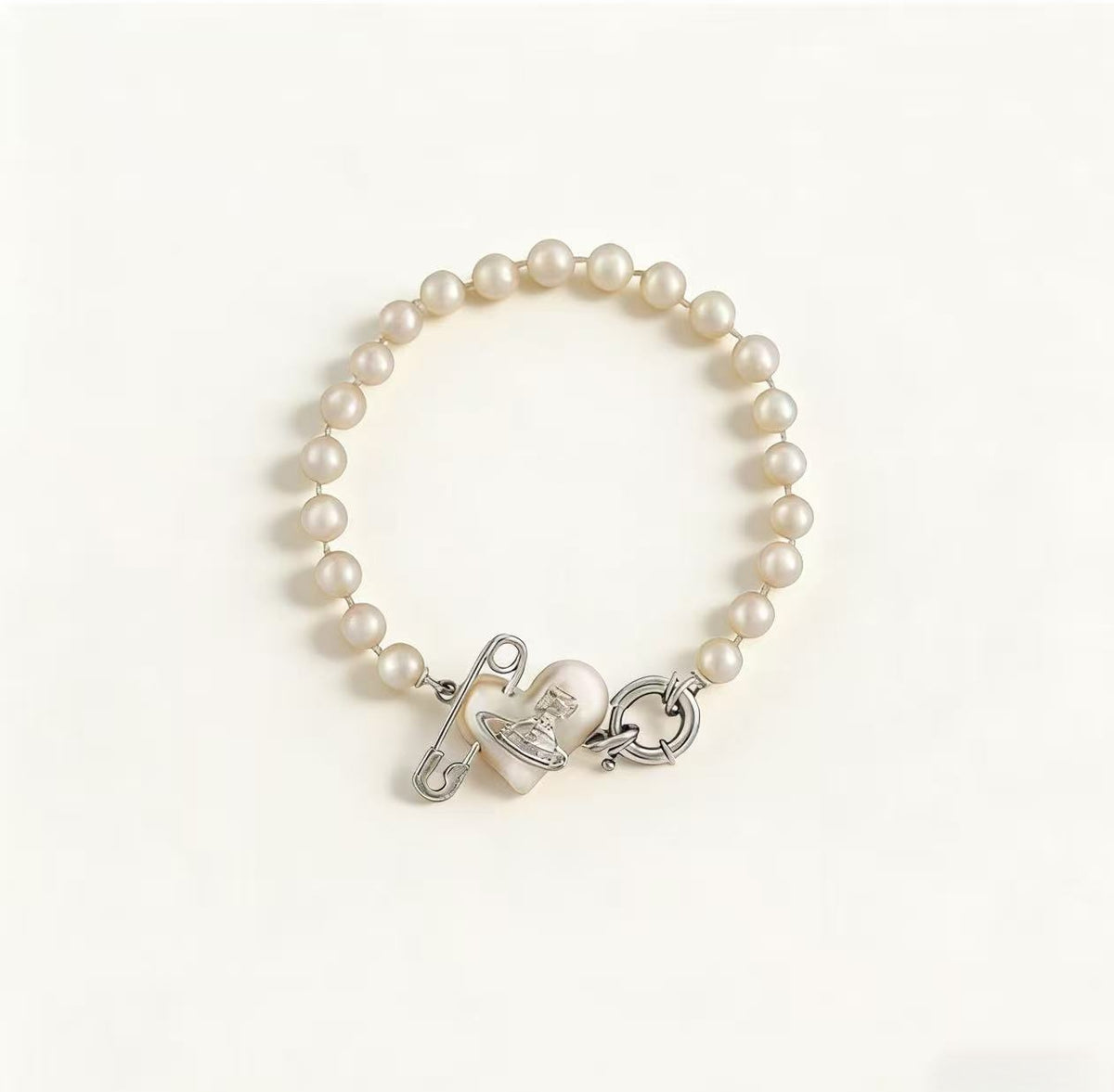 Classic Saturn pearl heart bracelet