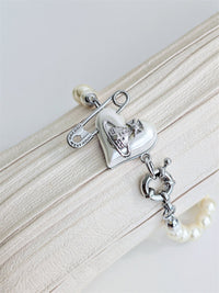 Classic Saturn pearl heart bracelet